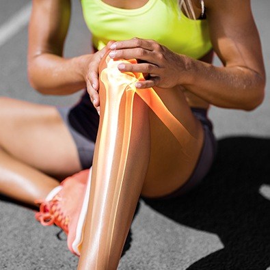 Woman's knee with animation of bones and muscles