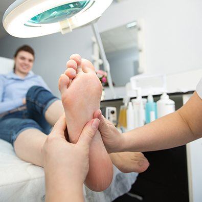 Doctor examining patient's foot