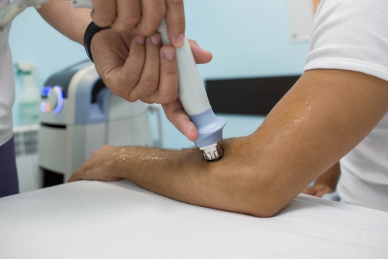 shockwave therapy procedure at clinic